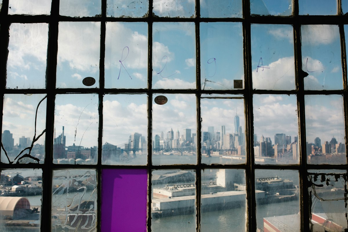 View of the New York skyline through a loft window